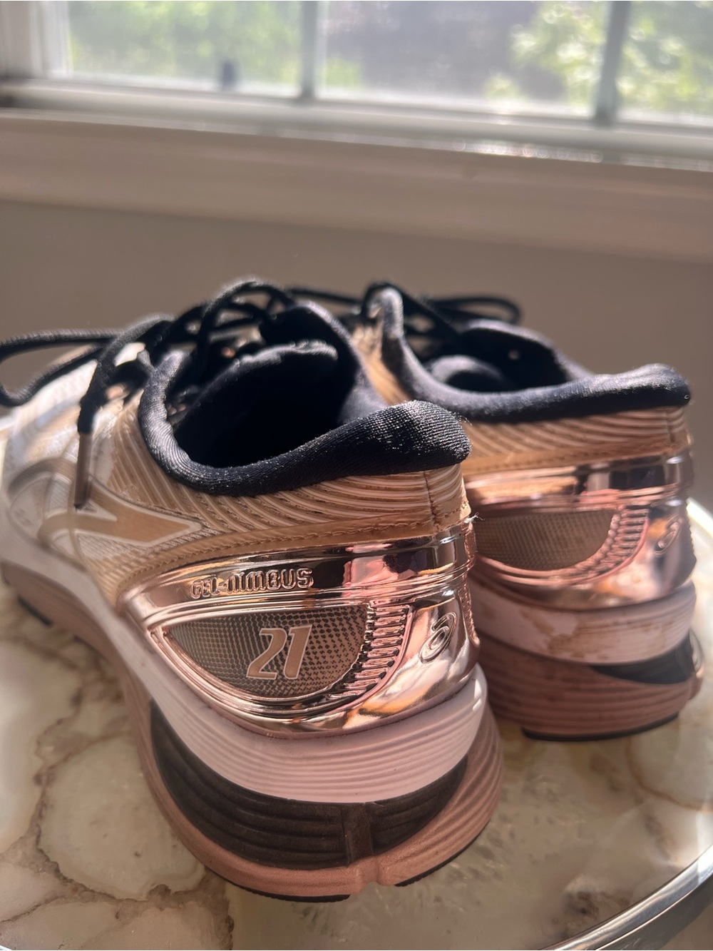 ASICS B/W Gel Nimbus 21 Athletic Sneakers with Gold Accents